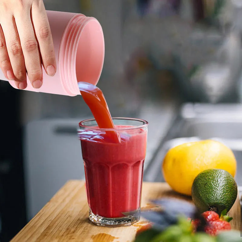 Blue portable personal blender with 450ml cup, shown extended and folded, with USB charging cable
