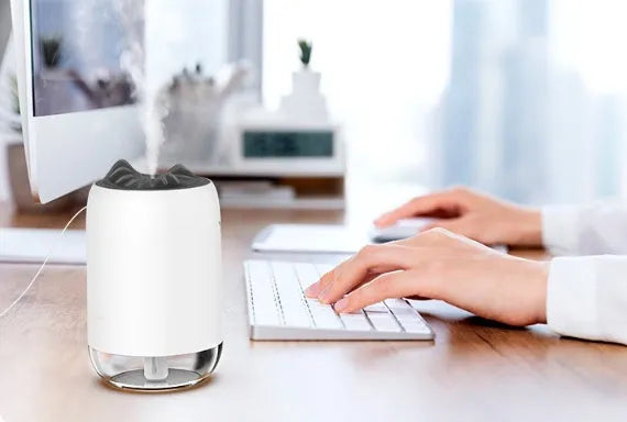 Mini cylindrical USB humidifier with 260ml water tank in green, pink or white colour options