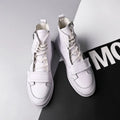 Men's black and white PU leather ankle boots with a high-top sneaker design for winter.