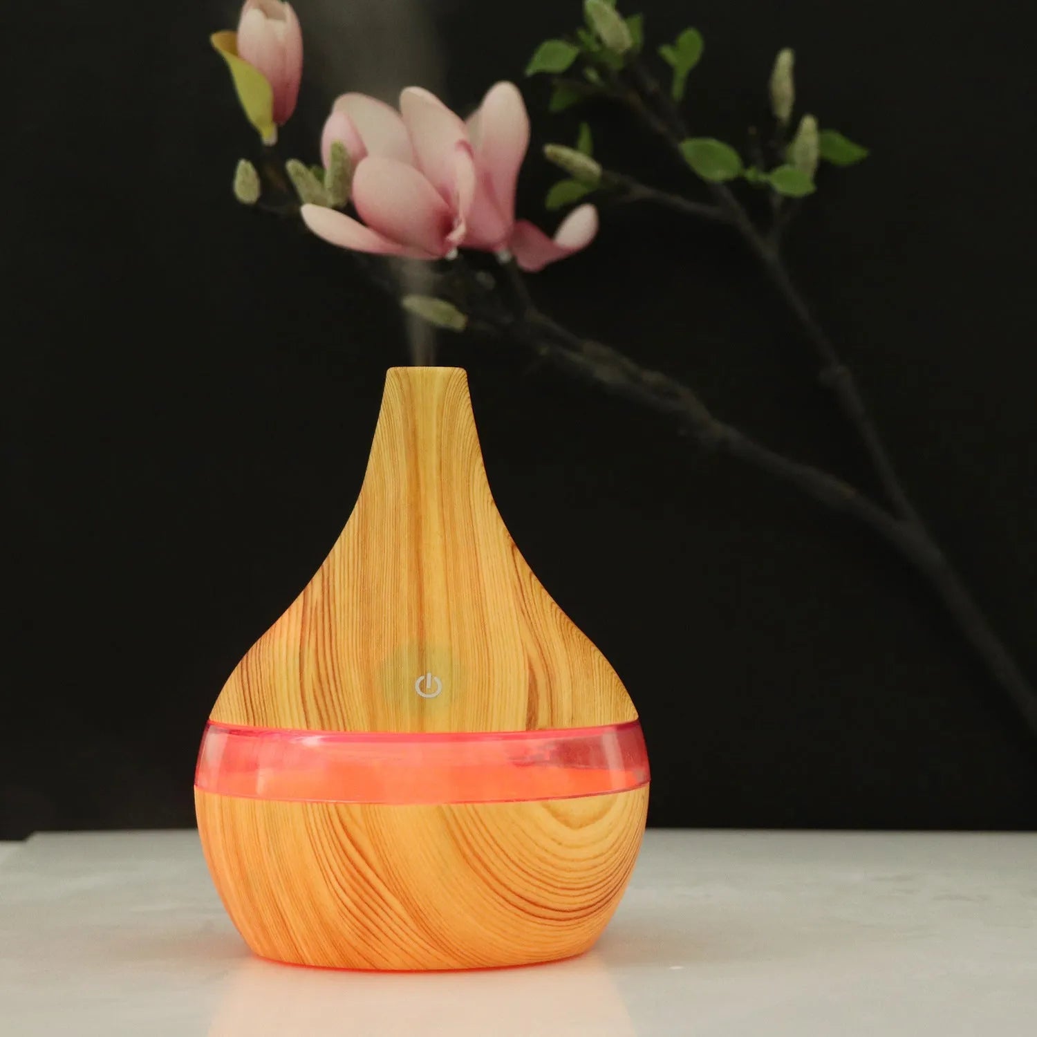 USB-powered mini humidifier in columnar design with wood grain finish and remote control