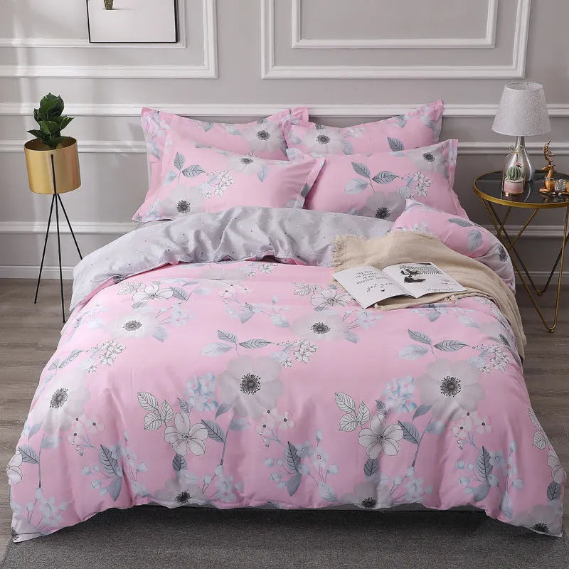 Cotton four-piece bedding set in multiple sizes with quilt cover, fitted sheet, and pillowcases