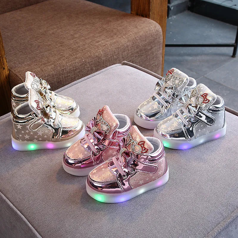 Children's LED light up shoes with button activation in golden, pink, or silvery colours