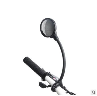 Black metal bicycle rearview mirror with hose adjustment clamp attached to handlebar
