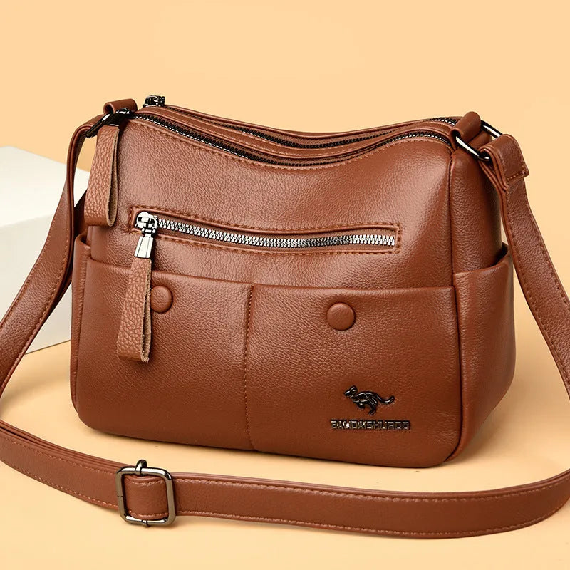 Soft PU leather women's crossbody bag in horizontal square design with multiple internal compartments