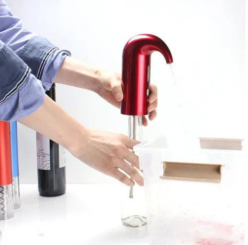 Portable electric wine decanter in black, red, or white with automatic pourer and red light.