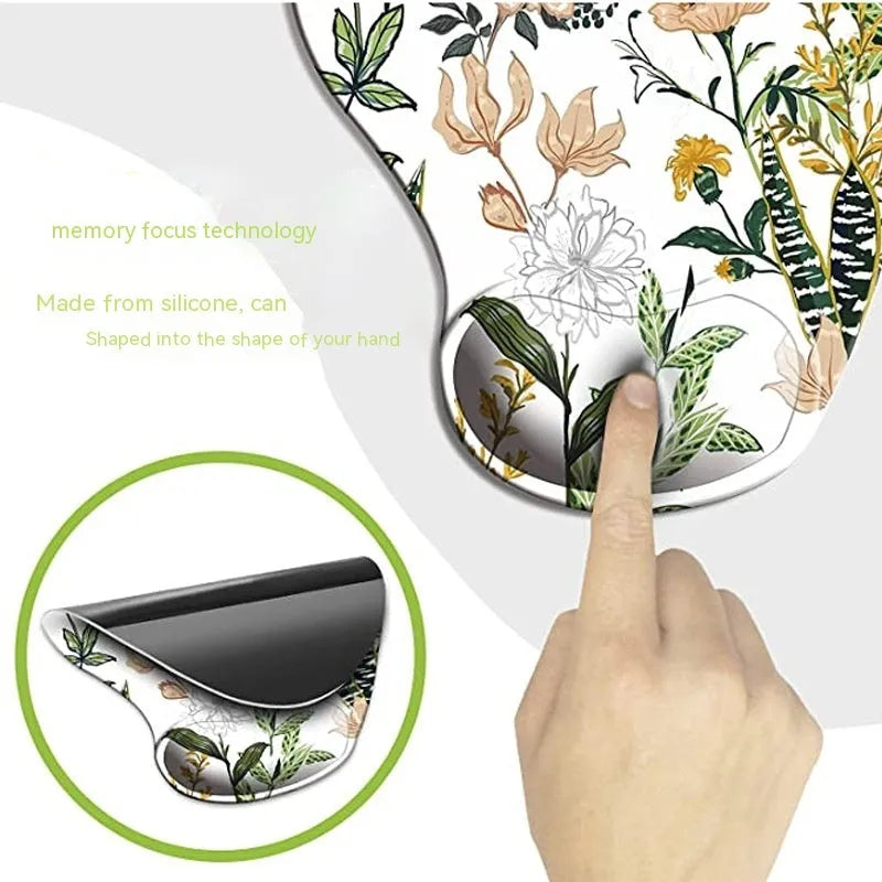 Black silicone keyboard pad with floral pattern and integrated wrist strap for wrist support