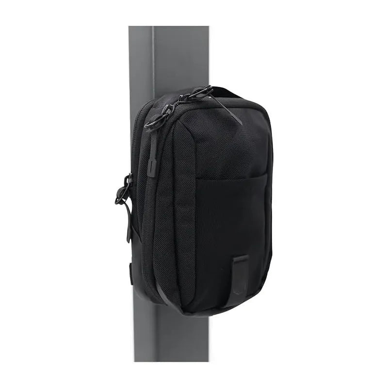 Black Oxford cloth fitness pannier bag with magnetic closure and polyester lining, hanging storage for indoor sports.