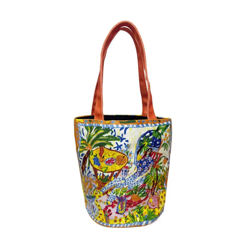 Dream Garden orange plush canvas Thailand artistic bucket bag with double straps and printed details.