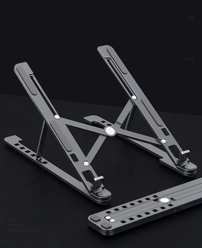 Aluminium foldable laptop stand in silver colour showing adjustable height and compact folded size.