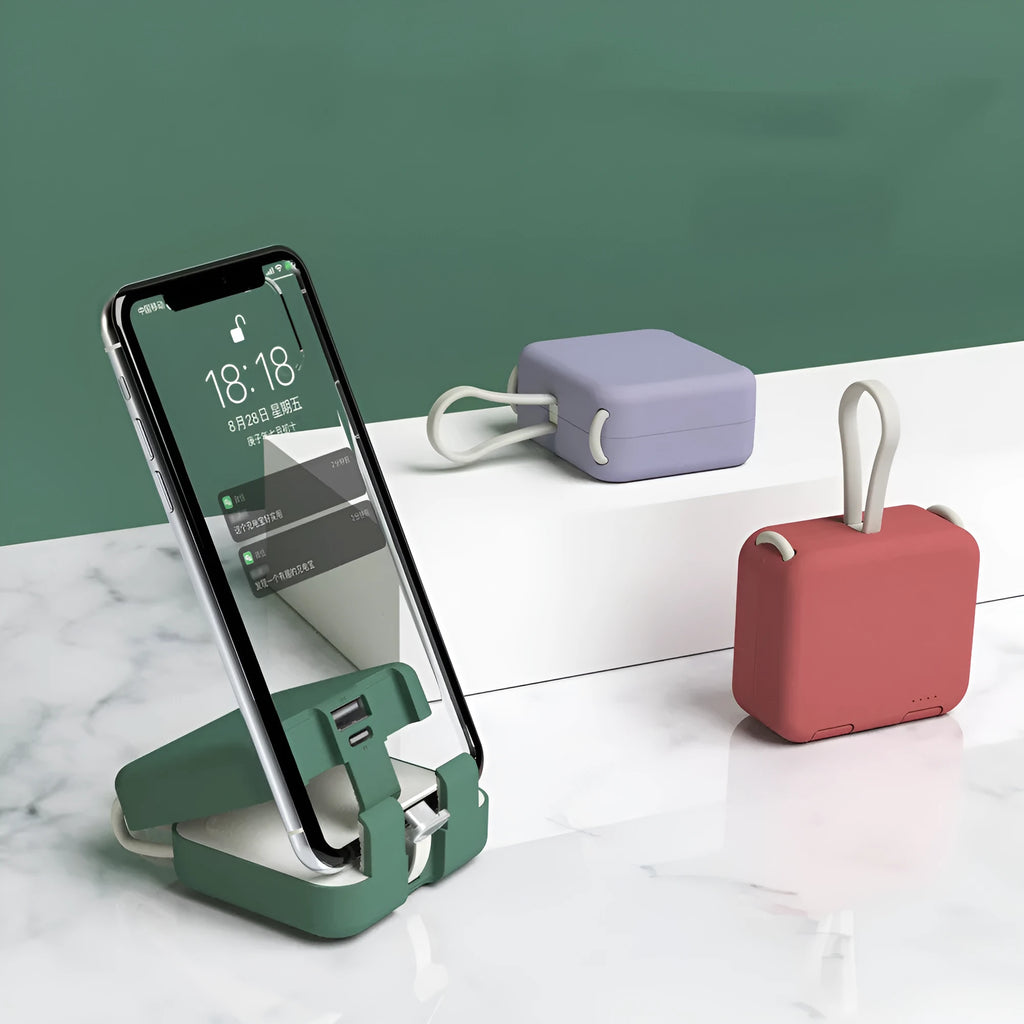 Handbag clip power bank in blue with mobile phone stand function showing charging ports