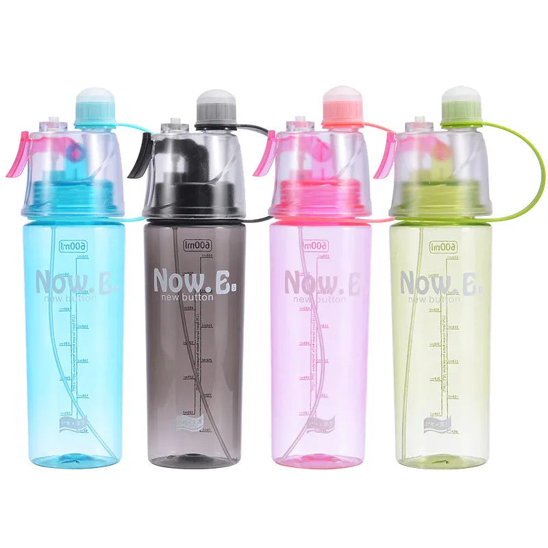 Green portable outdoor sports mist spray cup with handle, transparent scale, and spray mouth.