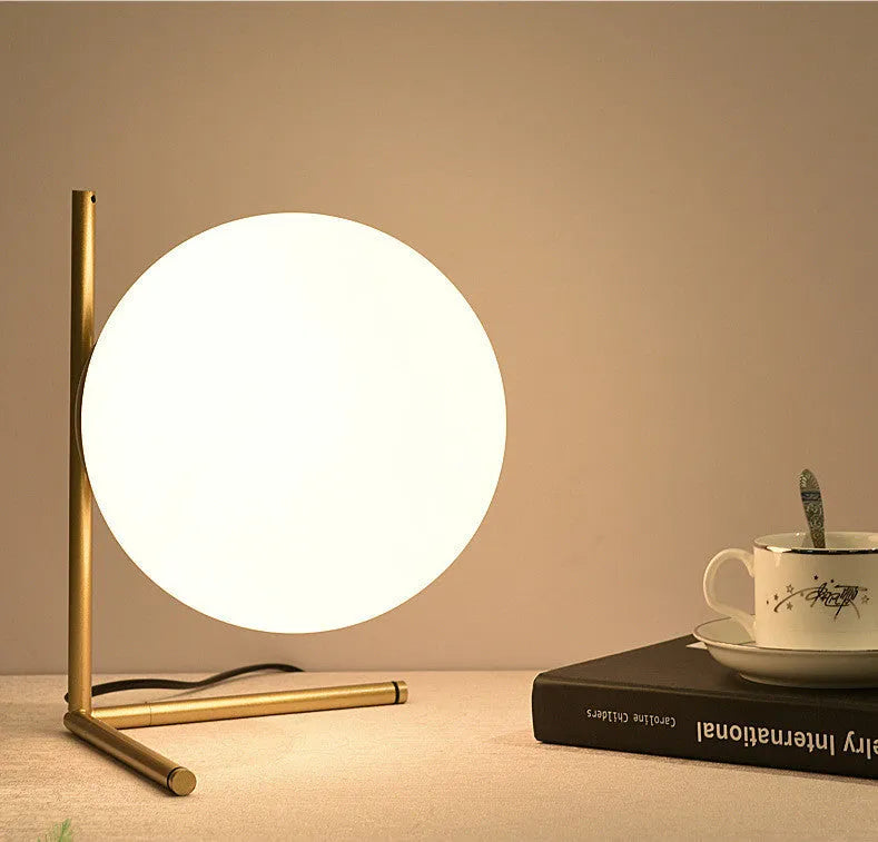 Creative modern floor lamp with glass shade in a living room setting