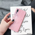Painted solid colour phone case for Honor and Huawei smartphones in black or pink.