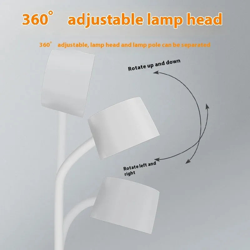 White intelligent wireless charging lamp with digital clock display on a wooden table.