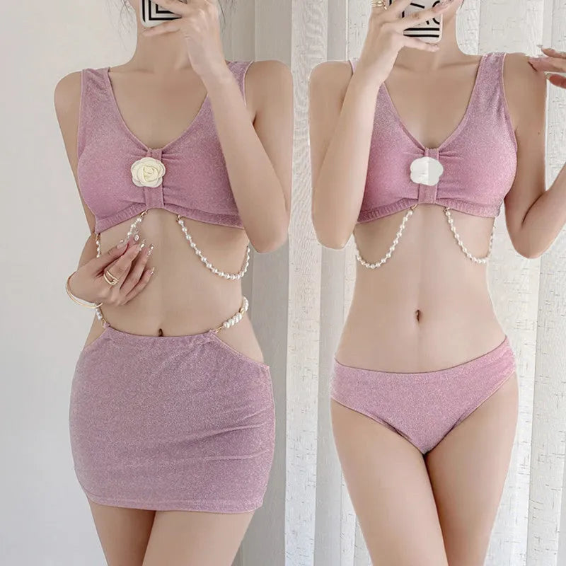 Women's three-piece bikini set in pink or black colours with briefs style and sleeveless design
