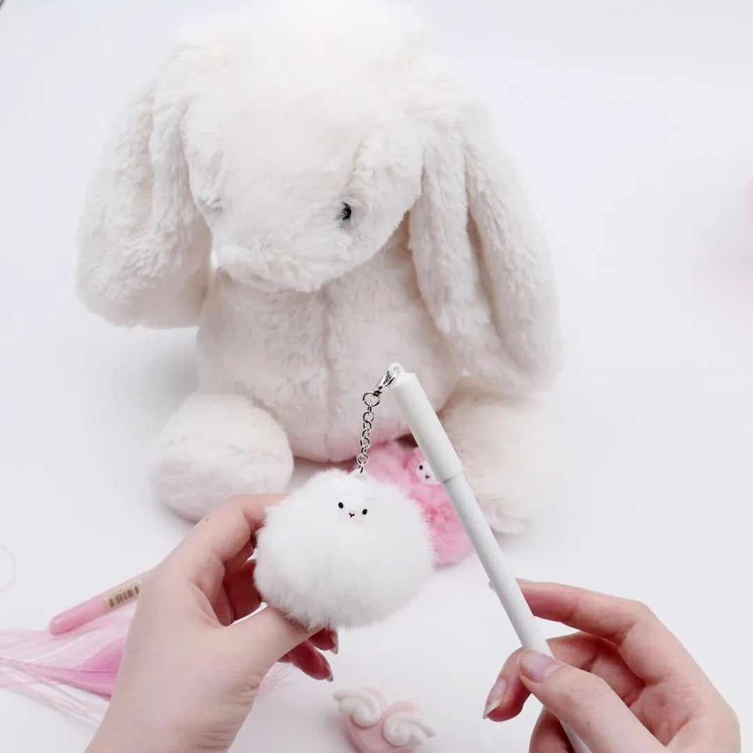Plastic ballpoint pen with alpaca hair ball pendant, length 17cm, 0.5mm tip.