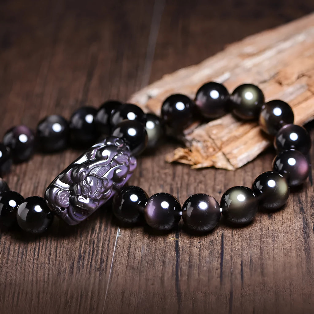 Polished crystal Pi Xiu bead bracelet showing geometric shape, available in multiple sizes and ice stone colours.