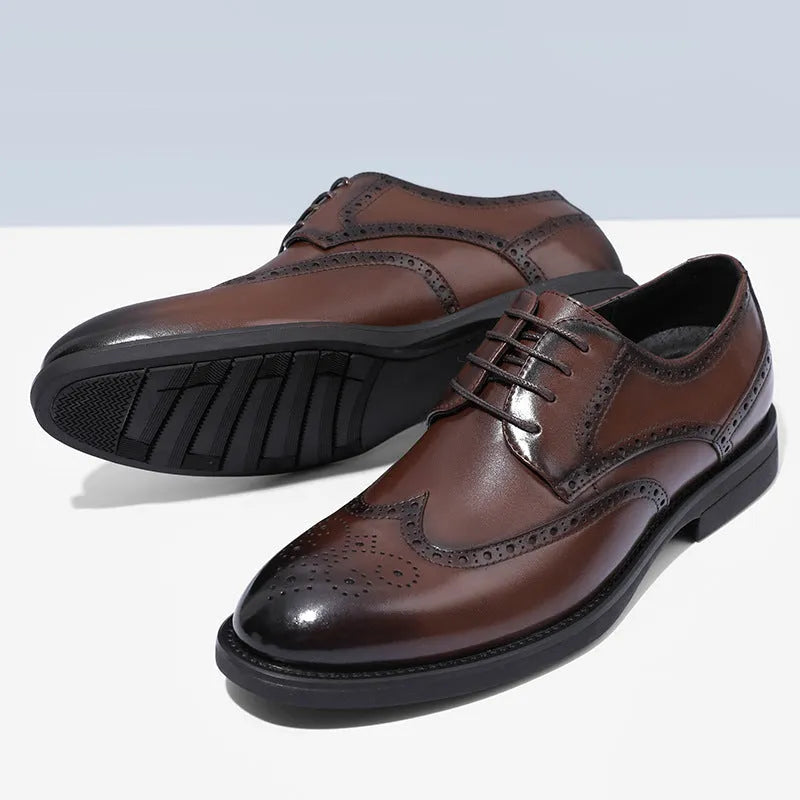 Men's black brogue leather shoes with traditional wingtip design and perforated patterns