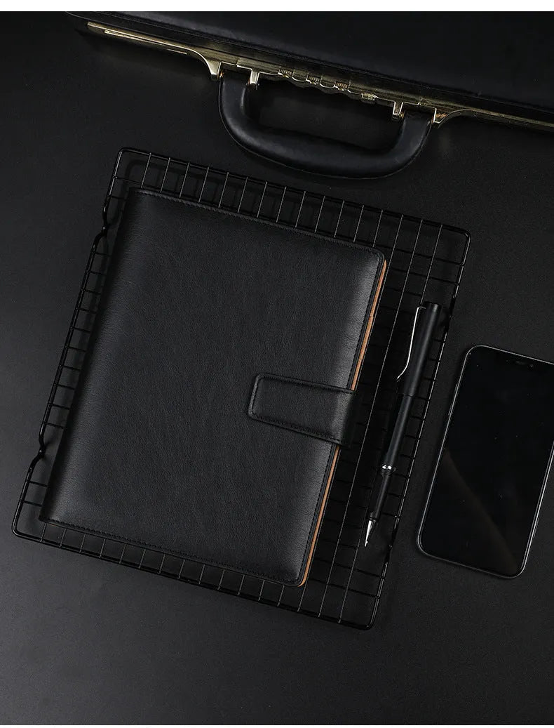 A5 leather notebook with 6-hole binder clip closure and hard cover