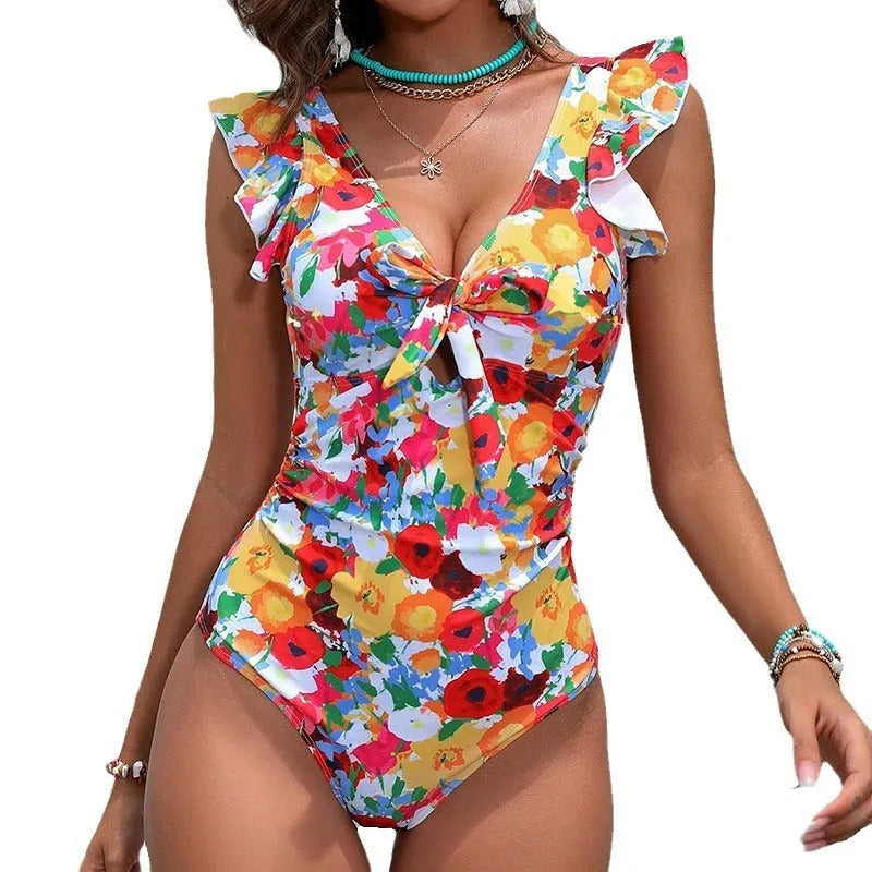 Women's printed one-piece swimsuit in polyester fabric with high elasticity for swimming.