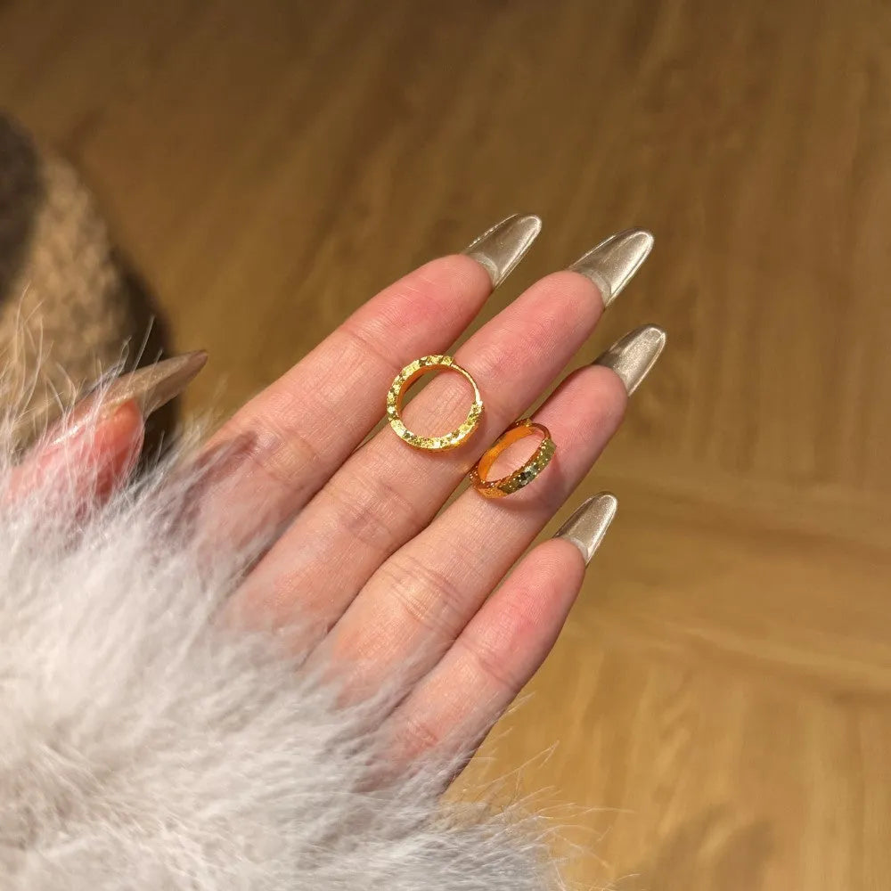 Pair of S925 sterling silver geometric scale stud earrings in gold finish with crushed ice texture