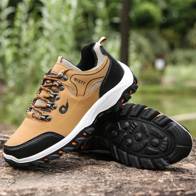 Men's outdoor hiking shoes in black with non-slip rubber outsole and lace-up closure