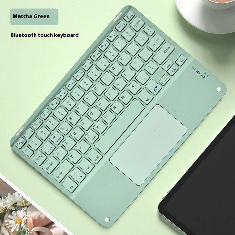 Square Hat touch Bluetooth wireless keyboard in green with wireless charging pad visible.