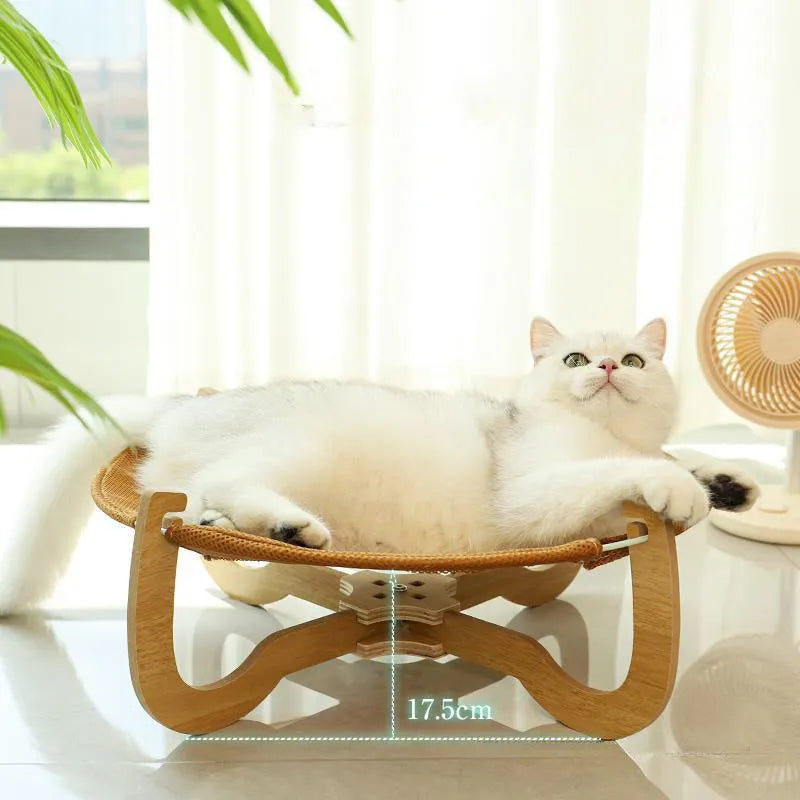 Brown woven rattan pet hammock measuring 46cm square with open weave design