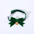 Pet velvet bow tie collar with anti-suffocation buckle in red velvet bow on small cat, S size