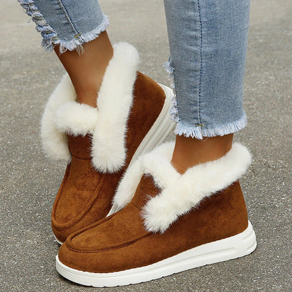 Cozy winter ankle boots for women with plush faux fur lining and suede upper in black, grey, and brown colors