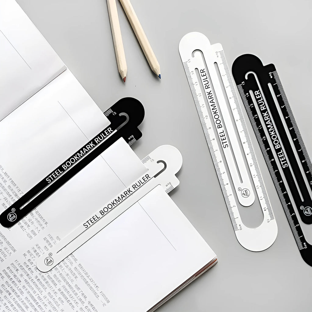 Black and white two-sided metal ruler showing 12 cm manganese steel construction