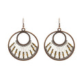 Bohemian hand-woven gold thread alloy earrings with geometric quadrilateral shape on a white background