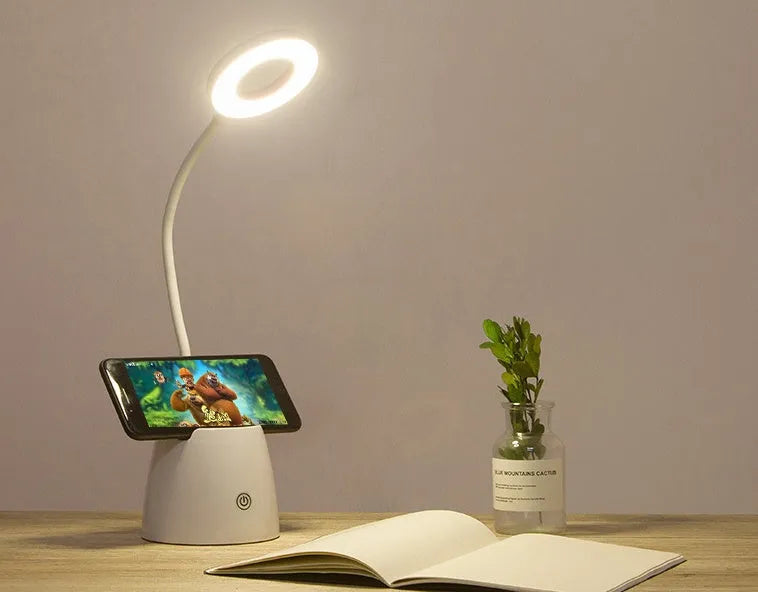 LED folding eye protection table lamp in beige, white, or three colour, with aluminium and ABS body, 8W output, and rechargeable battery