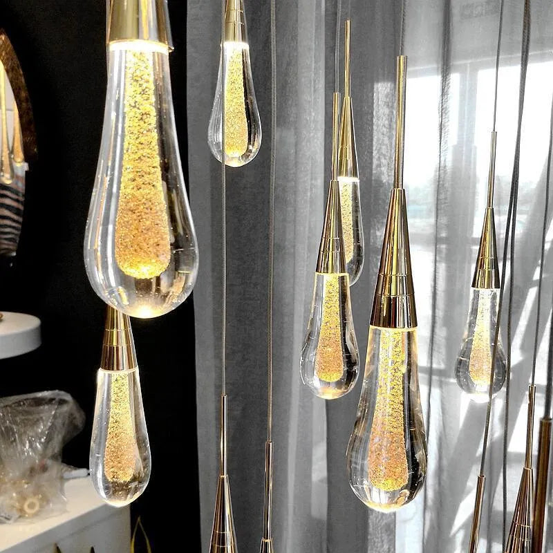 Single head crystal LED chandelier with adjustable cord showing postmodern design and warm white illumination