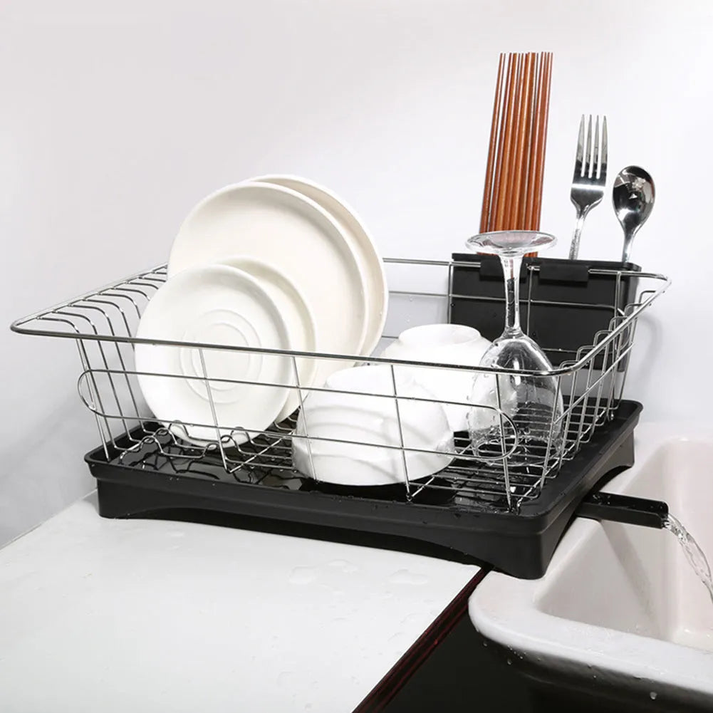 Stainless steel dish drying rack with black plastic drain board and cutlery holder