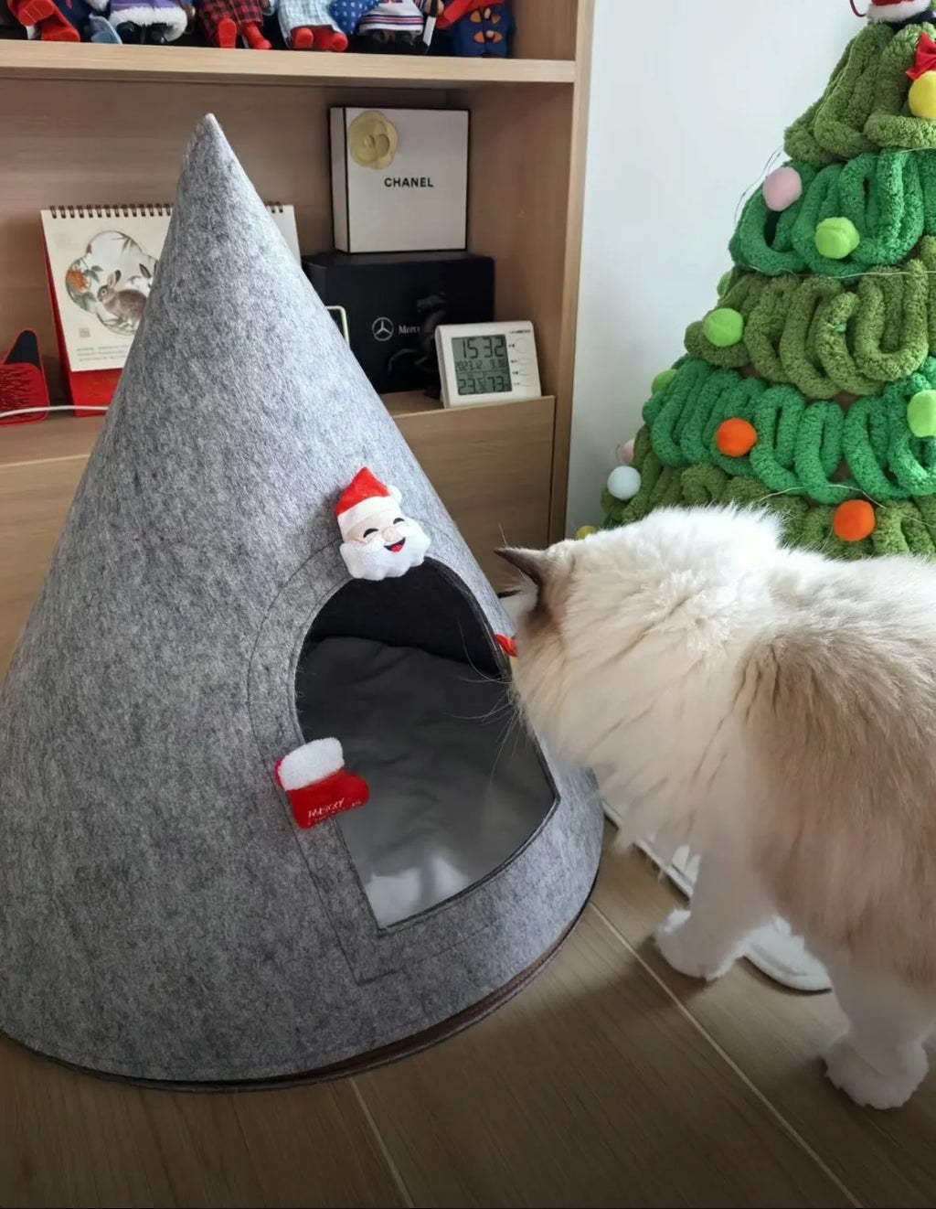 Grey cone-shaped felt cat house with enclosed tent design for indoor cats