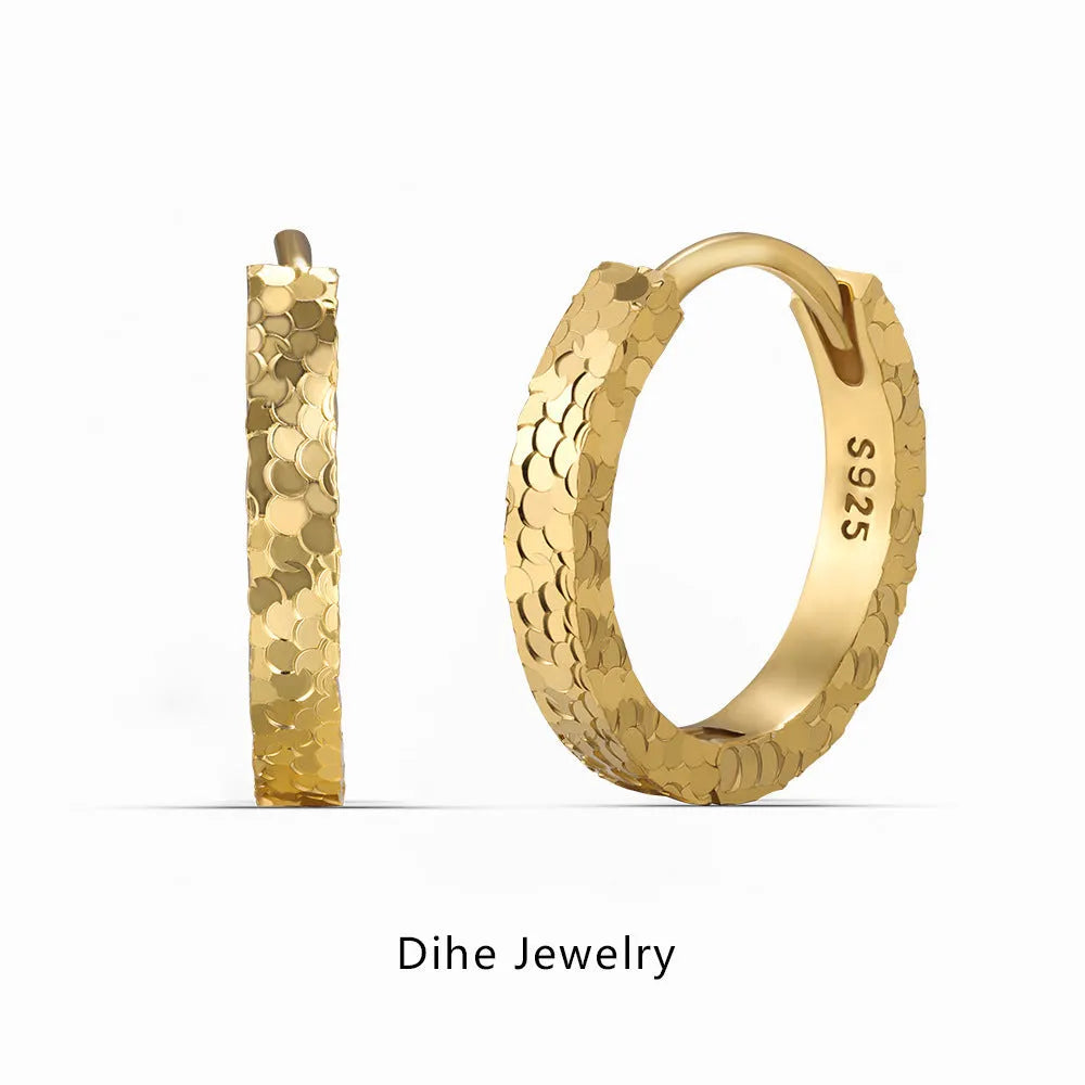 Pair of S925 sterling silver geometric scale stud earrings in gold finish with crushed ice texture