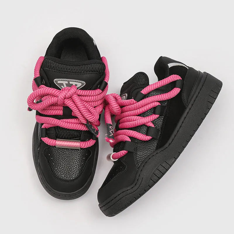 Casual lace-up trainers with thick rubber sole and mesh detailing in denim blue colour.