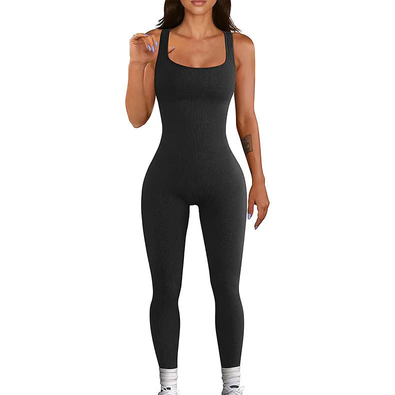 Women's beige long sleeve suspender tights with tank top straps and button details on a mannequin.