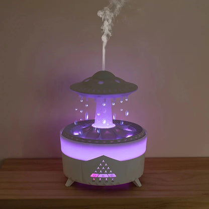 Relaxing rain cloud humidifier with essential oil diffuser, soothing rain sound, and customizable LED lights for a tranquil home environment