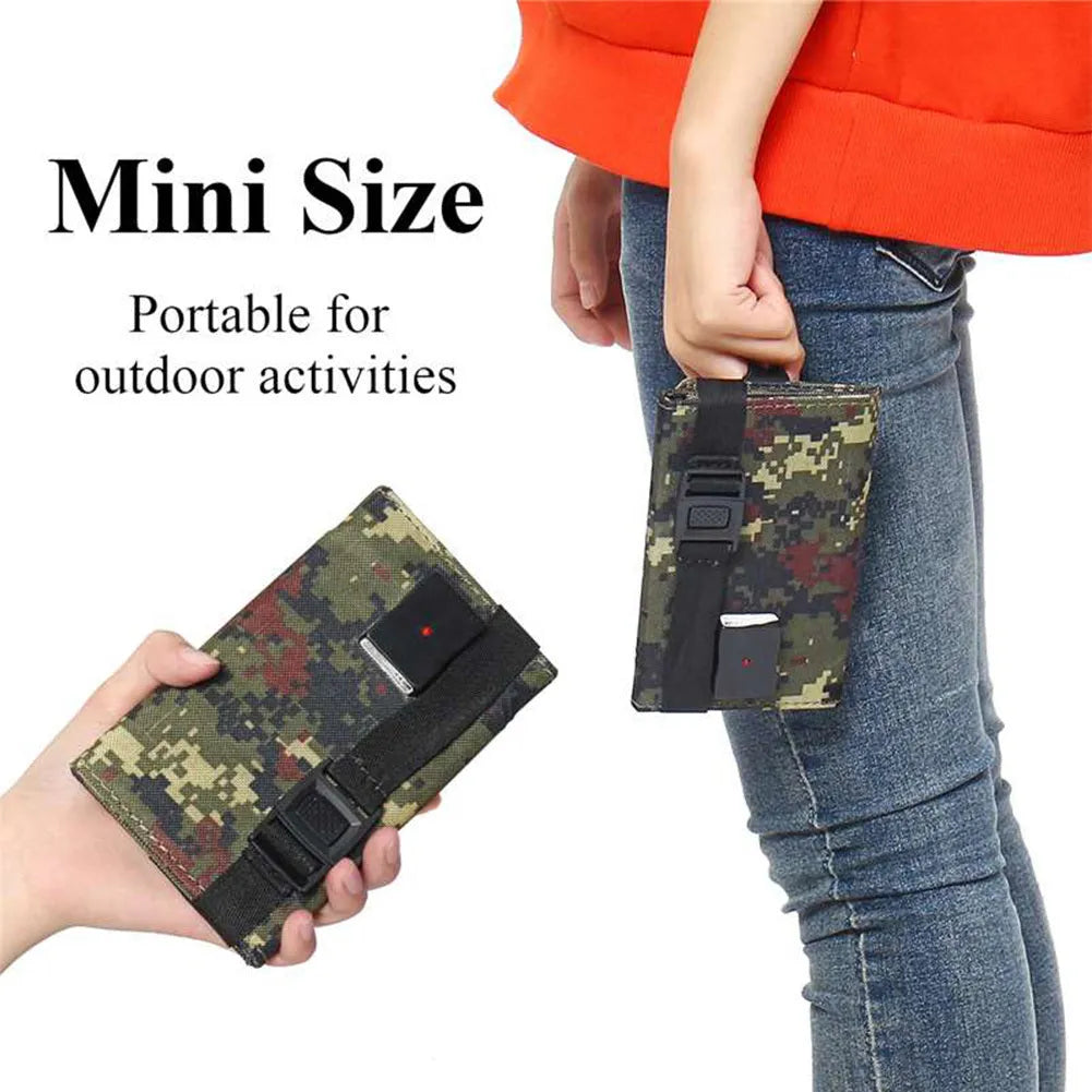 20W solar folding bag in camouflage with IP65 rating, expanded on grass with USB cable