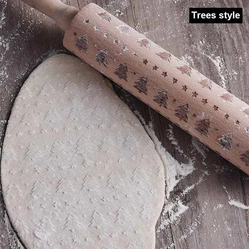 Personalized Christmas rolling pin with a variety of embossed holiday designs, including snowflakes, reindeer, and Merry Christmas patterns