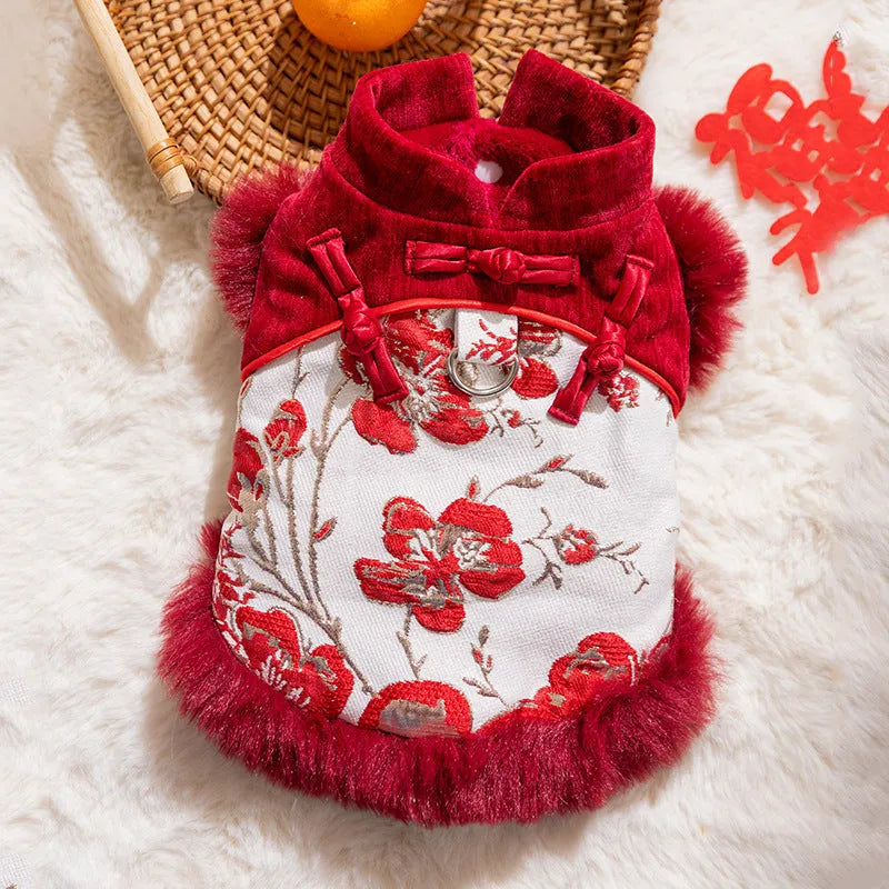 Chinese-style pet Tang Suit jacket in red with stand-up collar and fluffy trim on small dog