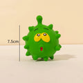 Four colourful natural latex dog squeaky balls with textured surfaces and cute faces
