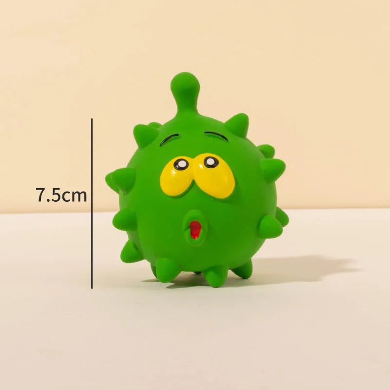 Four colourful natural latex dog squeaky balls with textured surfaces and cute faces