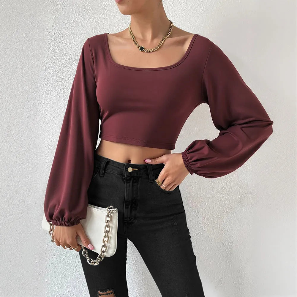 Wine red long-sleeved slim fit shirt with retro lantern sleeves and collage patchwork detail on polyester fabric