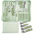 30-piece stainless steel nail beauty tool set showing cuticle tools, nippers, and files on a pink background.