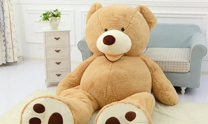 A plush, giant teddy bear with realistic facial features and a soft, huggable design