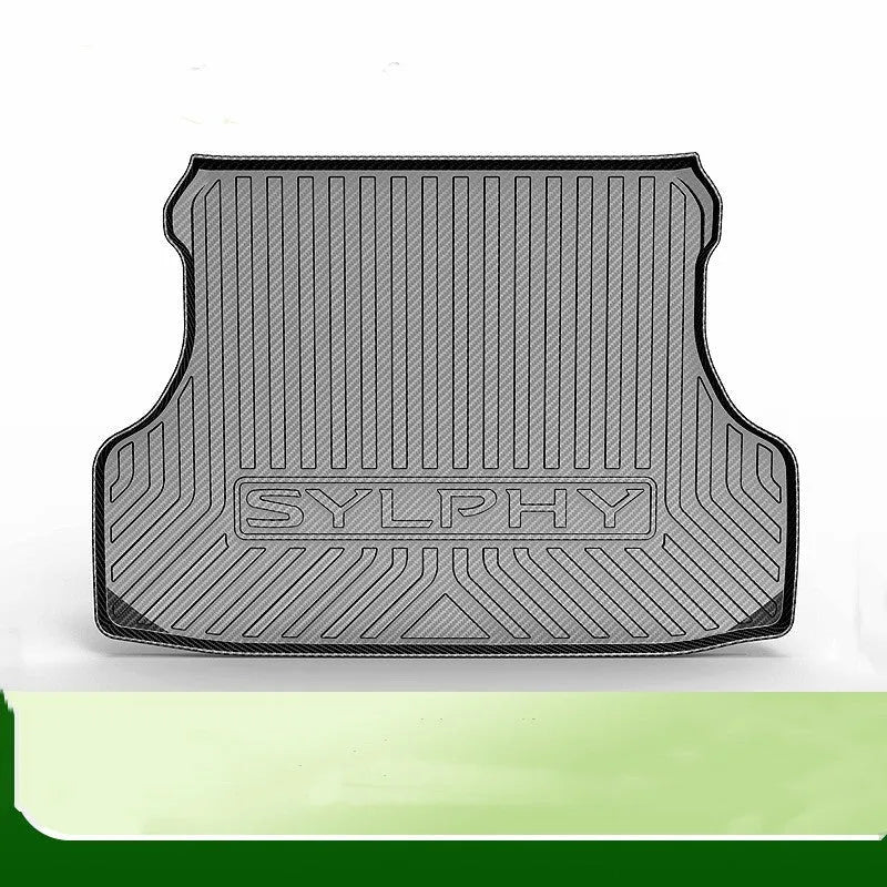 Black car boot liner with carbon fibre pattern texture, made from TPE material.