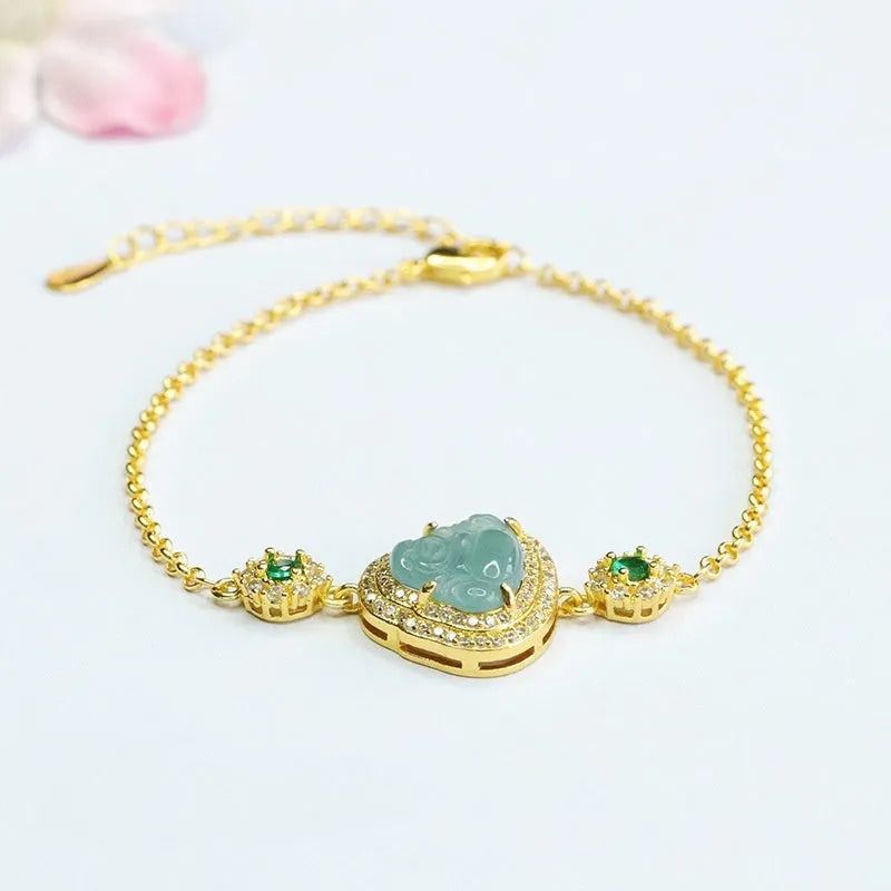Jade bracelet with inlaid Maitreya Buddha carving in emerald blue water colour